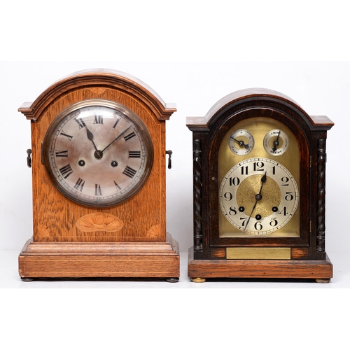 843 - A German inlaid oak arched top clock, late 19th c, with silvered dial, pendulum, 38cm h and a later ... 