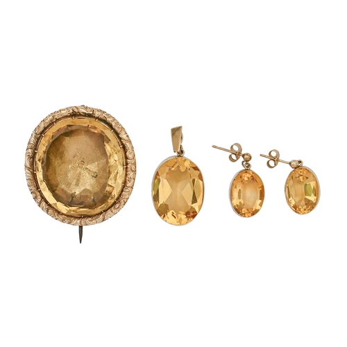 86 - A Victorian foiled citrine brooch, a citrine and gold pendant and pair of earrings en suite, brooch ... 