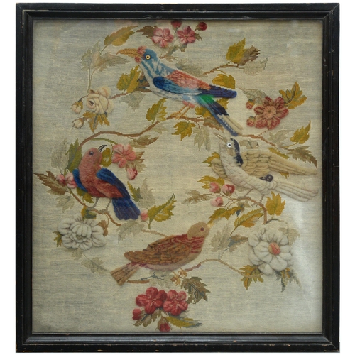 873 - A Victorian woolwork picture, birds in a tree, 63 x 58cm