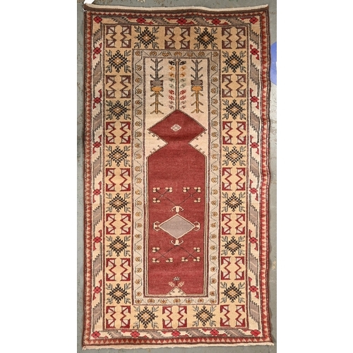 1073 - A Turkish melas prayer rug, West Anatolia, 205 x 120cm