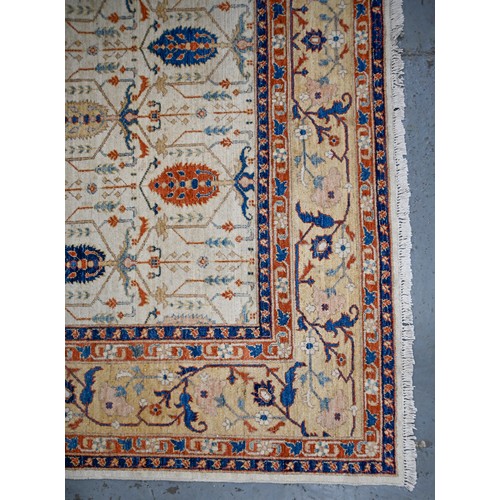 1062 - A Pakistani carpet, 290 x 253cm