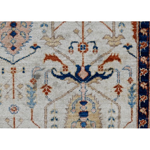 1062 - A Pakistani carpet, 290 x 253cm