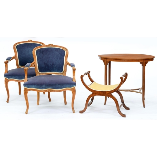 1006 - A pair of carved beech armchairs, first half 20th c, an Edwardian oval mahogany and satinwood occasi... 