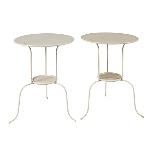 1040 - A pair of white painted metal tripod tables, 68cm x 51cm