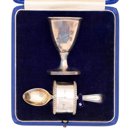 221 - A George V silver christening set of a cup, spoon and napkin ring, by Jay, Richard Attenborough &... 