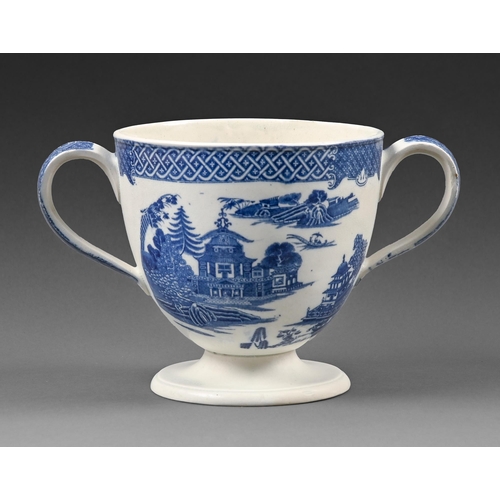 265 - A blue printed pearlware Chinoiserie pattern two handled cup, early 19th, 15cm h, collector's label&... 