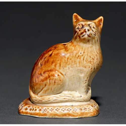 384 - A saltglazed brown stoneware model of a cat, Derbyshire, probably Brampton, c1840, 68mm h... 