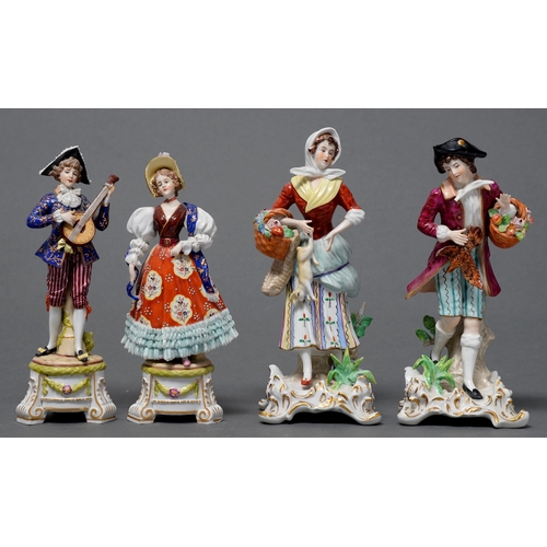 400 - A pair of Dresden figures, late 19th c, the gentleman playing the lute, on three scrolled feet, 18cm... 