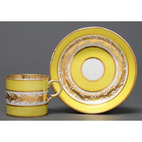 402 - A Derby coffee can and saucer, c1805, with a central band of gilt grasses reserved on a yellow groun... 