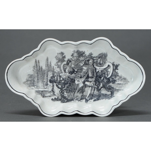 410 - A Worcester black onglaze transfer printed spoon tray, c1760, with the Tea Party No 2, engraved by R... 