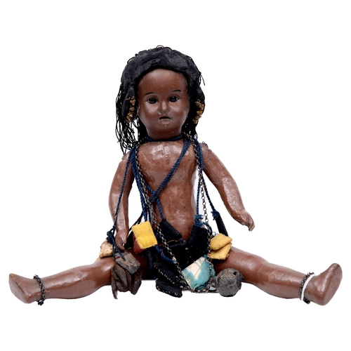 514 - A bisque head black doll in the form of a slave, early 20th c, with fixed glass eyes and open mouth ... 