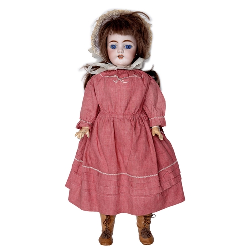 517 - A Simon & Halbig 1009 bisque head doll, c1900, with fixed eyes, open mouth and teeth, pierced ea... 