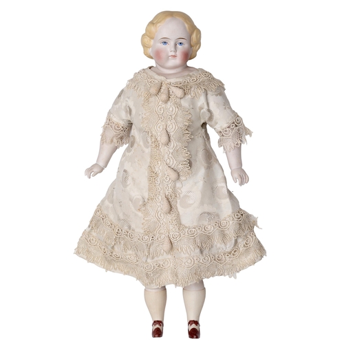 523 - A German Parian-type shoulder head doll, c1860-1870, with painted features and moulded blonde hair o... 