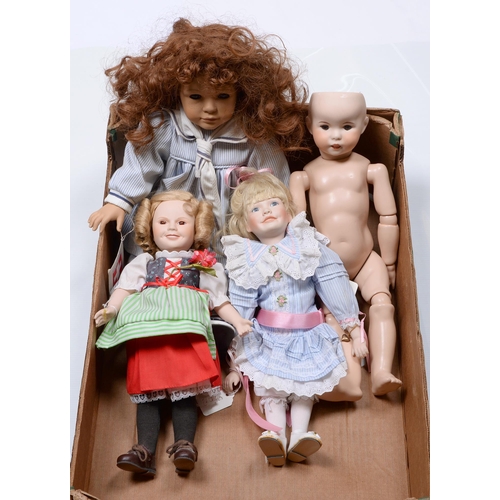 539 - Four bisque, porcelain and vinyl dolls, late 20th c, to include a MBI bisque Shirley Temple doll, c1... 