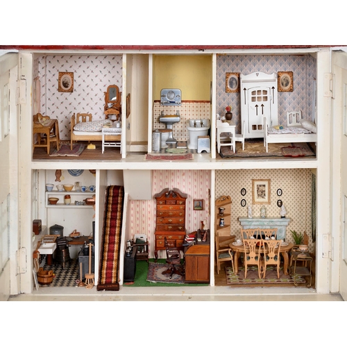 556 - A Moritz Gottschalk model 3581 dolls house, c1910, 59.5cm h, printed gesetzlich geschützt to base an... 