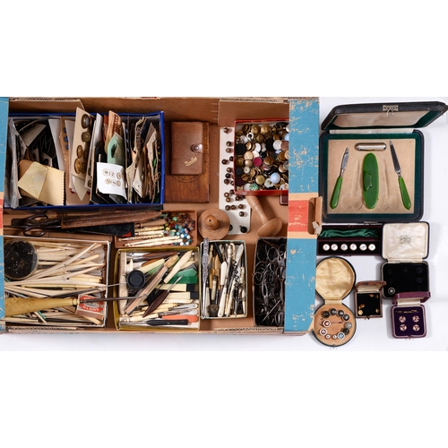 571 - Miscellaneous sewing tools and buttons, early 19th c and later, to include sets of glass, stone, and... 