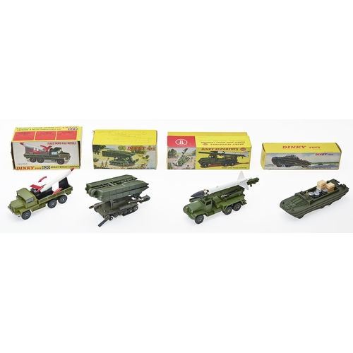 648 - Dinky toys. A 665 Honest John missile launcher, 620 Berliet missile launcher and two other military ... 