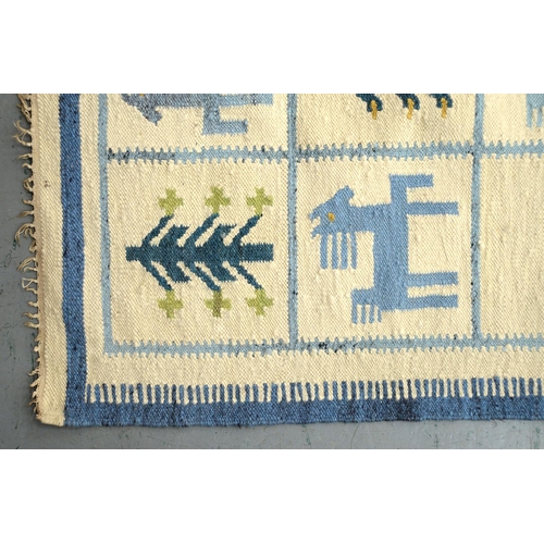 932 - A Polish wool geometric design rug, 241 x 144cm