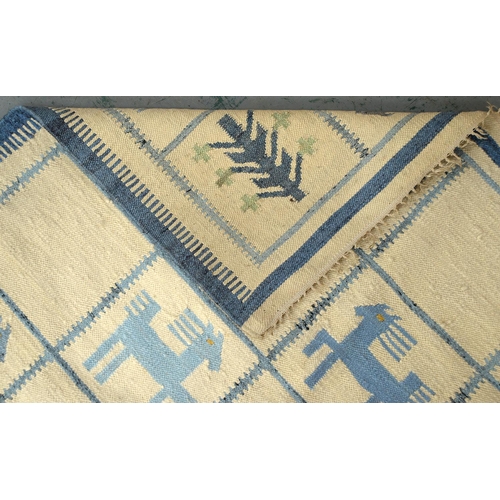 932 - A Polish wool geometric design rug, 241 x 144cm