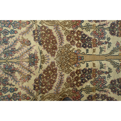 945 - A North West Persian tree of life carpet, 259 x 365cm