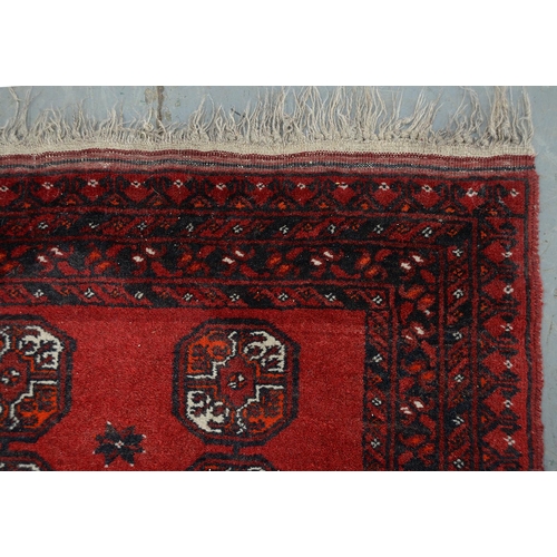 947 - A Middle Eastern runner and two rugs, 94 x 313cm, 105 x 165cm and 102 x 182cm