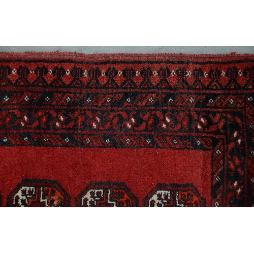 947 - A Middle Eastern runner and two rugs, 94 x 313cm, 105 x 165cm and 102 x 182cm