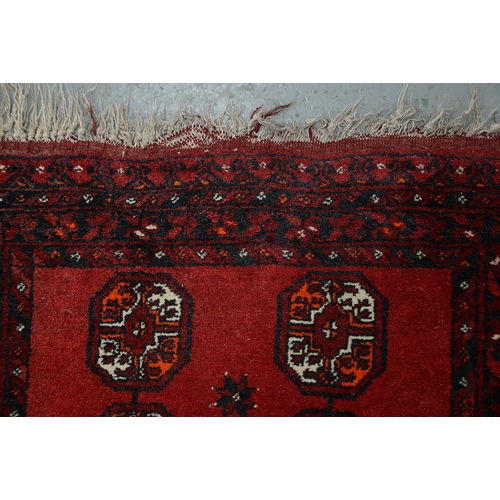 947 - A Middle Eastern runner and two rugs, 94 x 313cm, 105 x 165cm and 102 x 182cm