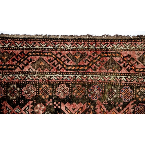 948 - A Middle Eastern rug, 202 x 105cm