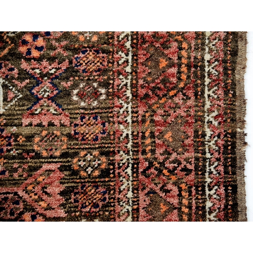 948 - A Middle Eastern rug, 202 x 105cm