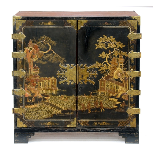 984 - A black japanned cabinet, late 19th c, the doors, sides and fitted interior with chinoiserie, elabor... 