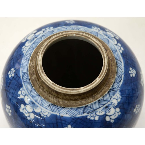 428 - A Chinese blue and white ginger jar, Kangxi, painted with prunus on a cracked ice ground, 17cm h, wo... 