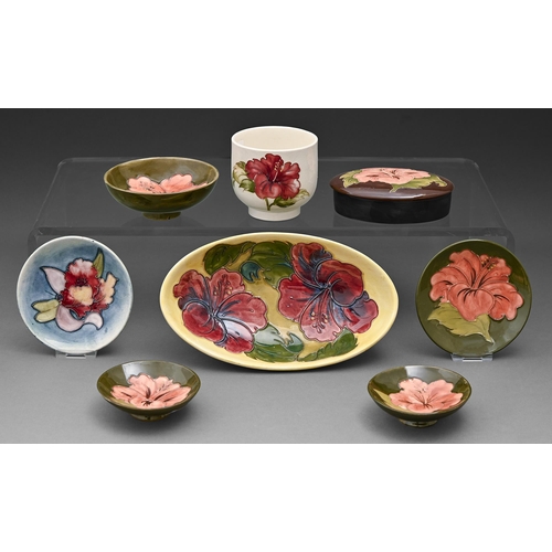 118 - Five Moorcroft Hibiscus dishes, box and cover and jardiniere and an Orchid dish, mid/late 20th c, im... 