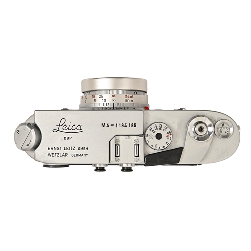 258 - A Leica M4 rangefinder camera, chrome, serial No 1184185, with Leitz Elmar f2.8 50mm lens, serial No... 