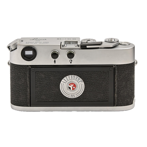 258 - A Leica M4 rangefinder camera, chrome, serial No 1184185, with Leitz Elmar f2.8 50mm lens, serial No... 