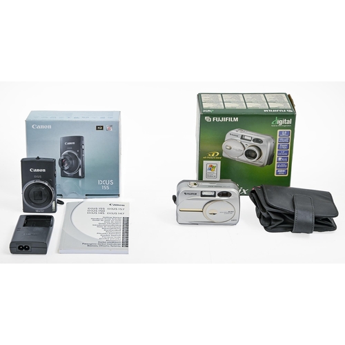 264 - Digital photography. A Canon Ixus 155 compact camera, with accessories, booklet and box and a Fujifi... 