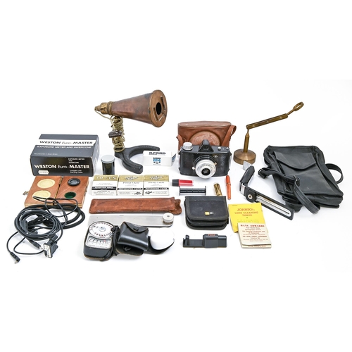 267 - Vintage photography. Miscellaneous vintage cameras and accessories, including an early 20th c copper... 