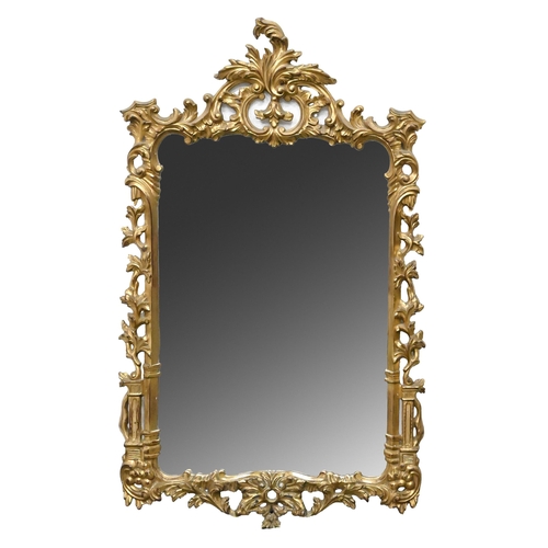 594A - A reproduction rococo gilt mirror, 107cm h