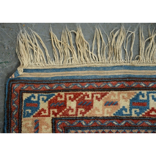 611B - A Middle Eastern rug, 204 x 114cm