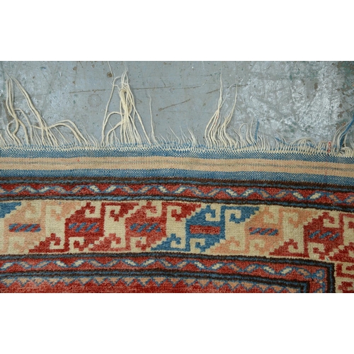 611B - A Middle Eastern rug, 204 x 114cm