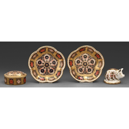 71 - A pair of Royal Crown Derby Imari pattern pin trays, a trinket box and a paperweight in the form of ... 