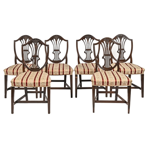 715 - A set of six mahogany carved shield back dining chairs, mid 20th c