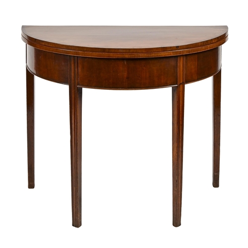 718 - A George III mahogany and crossbanded tea table, 72cm h; 43 x 87cm