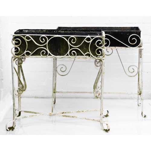 837 - A white painted wrought iron jardiniere stand and liner, early 20th c, with X-stretcher base, 61cm h... 