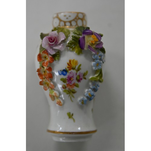 72 - Miscellaneous continental porcelain and a Minton floral encrusted ewer and stopper, early 19th c and... 