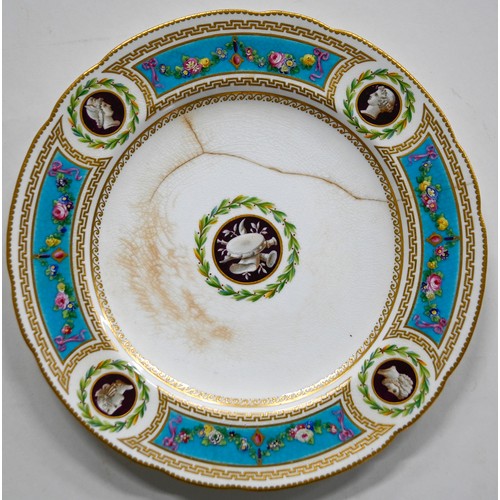 81 - A set of nine Minton dessert plates, 1862, painted with a central musical trophy, the border painted... 