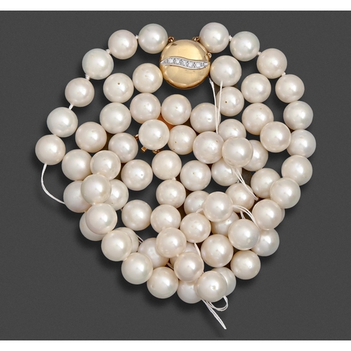 103 - A cultured pearl necklace, late 20th c, of approx 10mm cultured pearls, bun shaped gold and diamond ... 