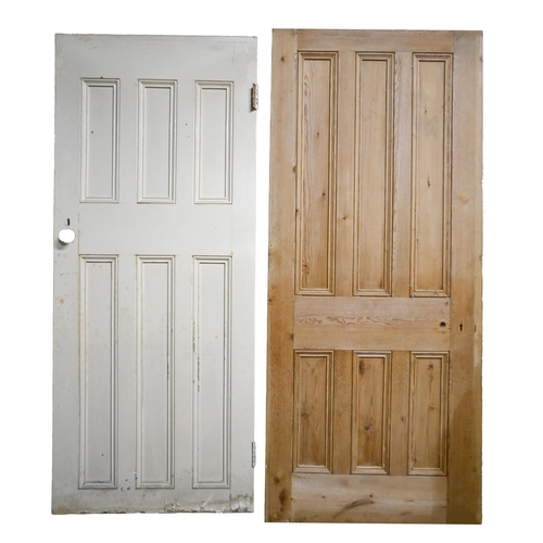 1161 - A pair of Victorian panelled pine doors, 207 x 85cm, another later painted, 203 x 85cm and another l... 