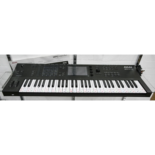 1214 - An Akai Professional MPC Key 61 music production keyboard, 99cm w, with power lead