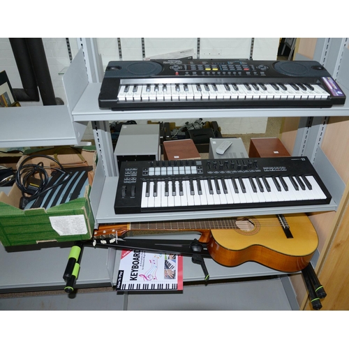 1217 - A Rock Jam RJ549 keyboard, Novation Launch Key49 keyboard and stand and a Resonata acoustic guitar, ... 