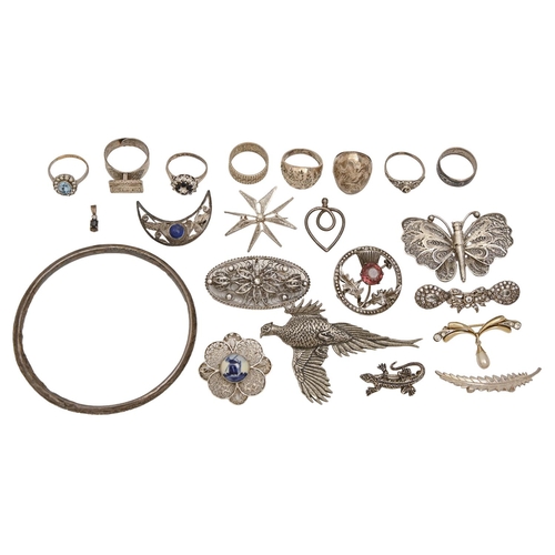 131 - Miscellaneous silver articles, including a filigree butterfly brooch and rings and a pewter pheasant... 